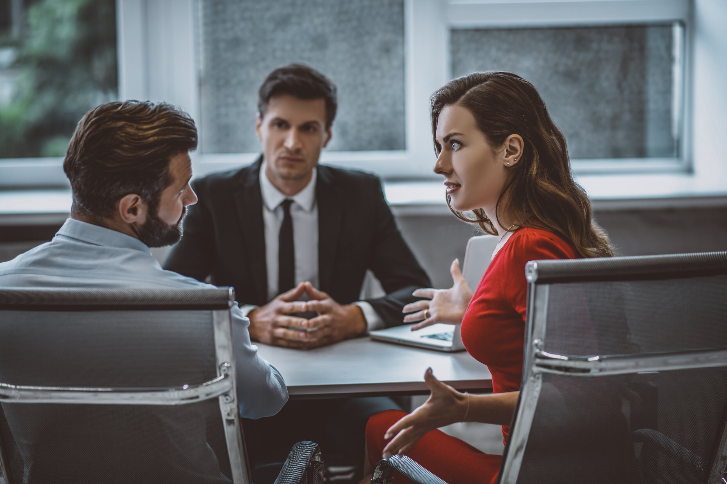 establishing,communication.,three,colleagues,having,a,business,meeting,in,the