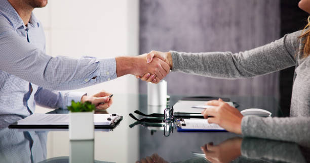 lawyer hand document review and contract mediation