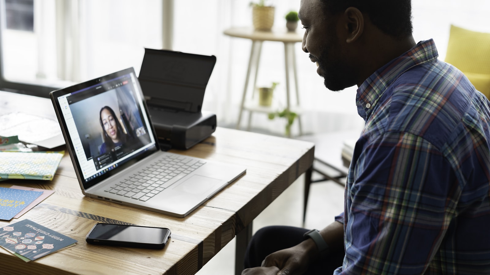 Person in an online video consultation weighing divorce mediation versus hiring a lawyer