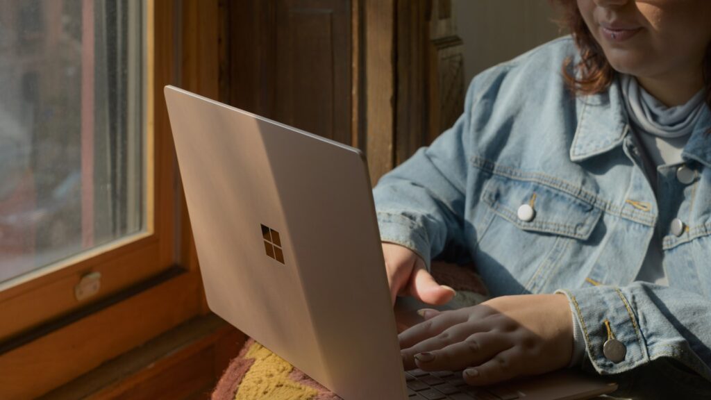 Woman in an online divorce mediation video session at home